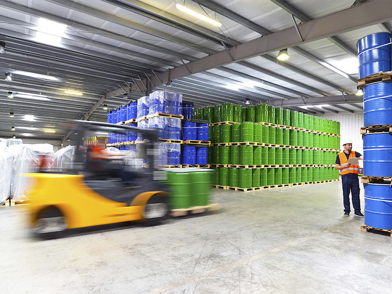 Businessman talking on cell phone in office Man using Warehouse Equipment