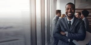 African American man in office by the window