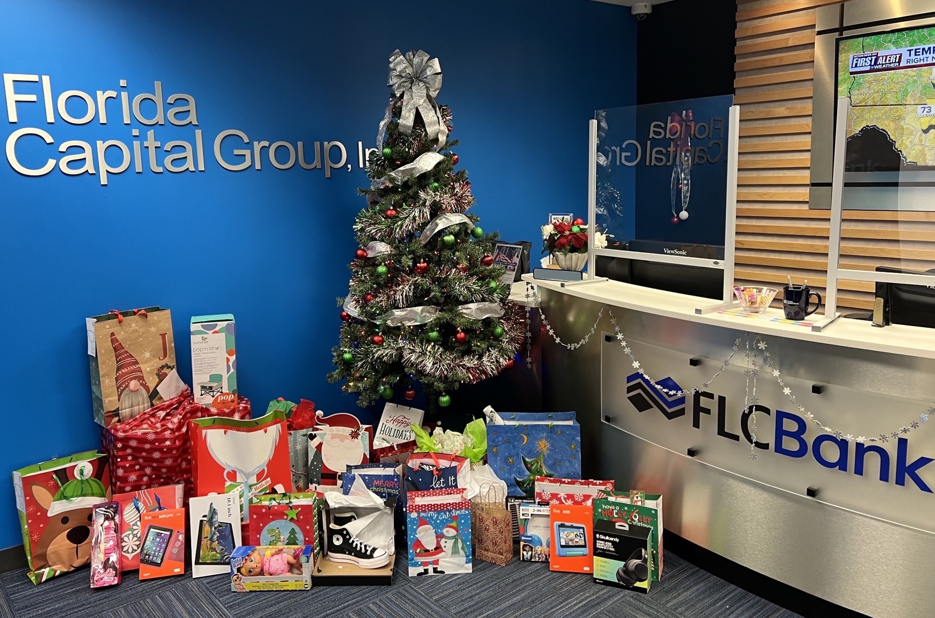 Angel tree 2022 with gifts_FLCBank Habijax 2019_ group photo